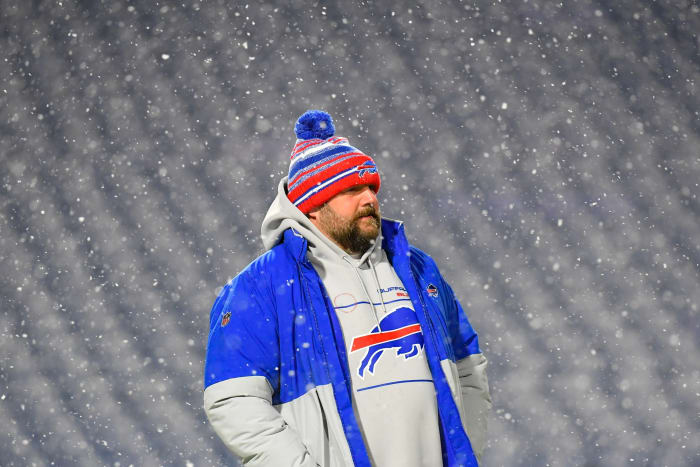 Dec 6, 2021; Orchard Park, New York, USA; Buffalo Bills offensive coordinator Brian Daboll looks on during a snow storm prior to the game against the New England Patriots at Highmark Stadium.